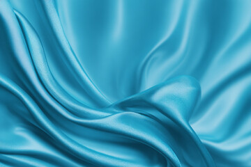 Obraz premium flowing turquoise silk fabric with soft folds and light reflections