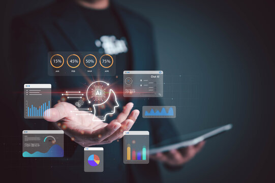 Businessman holding AI technology icons with data analytics, machine learning charts, and virtual interface. Concept of artificial intelligence in business and big data.
