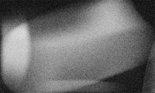 Grainy photocopy noise texture with dusty scanner effect and rough grayscale grain. Retro Y2K xerox grunge background with uneven density, soft gradients and chaotic dotted pattern.