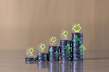 Stacks of coins with percentage growth icons and a person saving money, saving money for future education,Piggy  Stack of Coins for Wealth Growth.