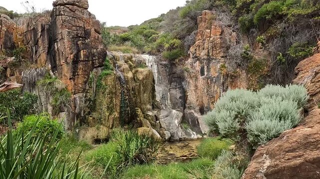 Quinninup Falls, Seasonal Waterfall Cascading Over Orange Granite Cliffs on the Western Australia Coastal Hike