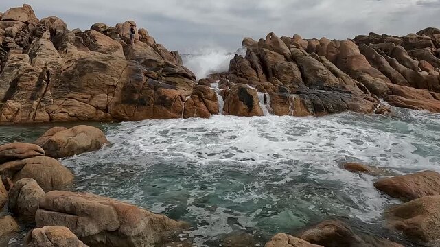 Injidup Natural Spa, Overcast Sky Over Unique Rock Pool with Crashing Waves and Sculpted Granite Formations, Western Australia