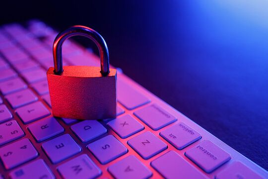 Cyber security lock symbolizes internet protection on a computer keyboard in a digital setting