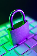 Cyber security lock on laptop keyboard representing internet safety and data protection