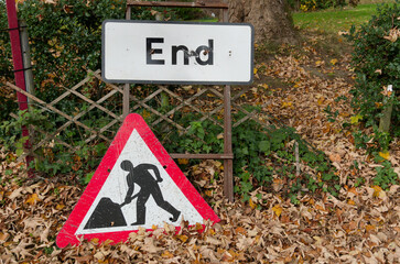 road work construction sign on a road
