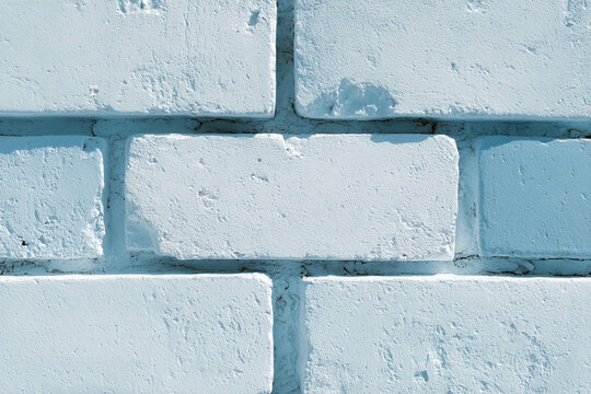 Close up of light blue painted brick wall texture