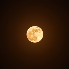 Obraz premium A glowing full moon set against a textured, earthy brown background, suggesting mystery and ancient celestial phenomena ,graphic ,nocturnal ,satellite