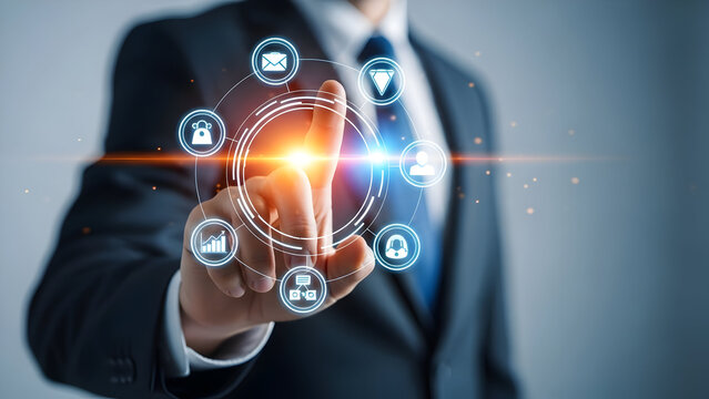 Businessman interacting with digital interface displaying icons of various industries and services