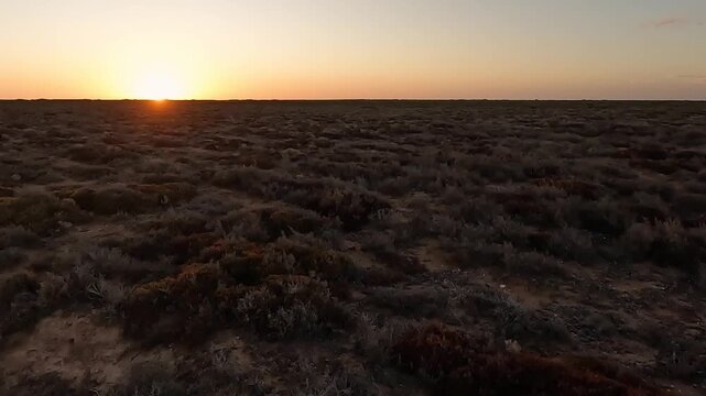 Australian Outback Sunset: A Vast and Remote Landscape at Koonalda Homestead, Nullarbor Plain