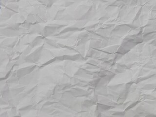 White Crumpled and Wrinkled Paper Texture. Abstract Background of Crushed and Folded Waste Paper for Web Design, Poster Mockups, or Photo Overlays.