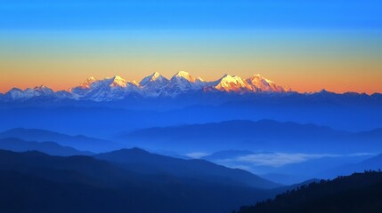 Majestic snowy mountains dawn with a golden sunrise casting a warm glow over the snow capped peaks mist rising in the valleys and a clear blue sky stretching above the rugged landscape