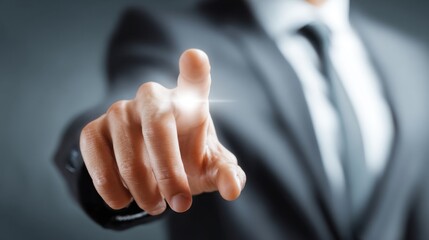 Businessman hand touching glowing digital interface