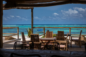 A beautiful restaurant on the beach in Zanzibar. Sunny day. Clear sea.