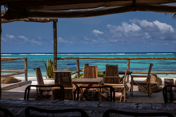 A beautiful restaurant on the beach in Zanzibar. Sunny day. Clear sea.