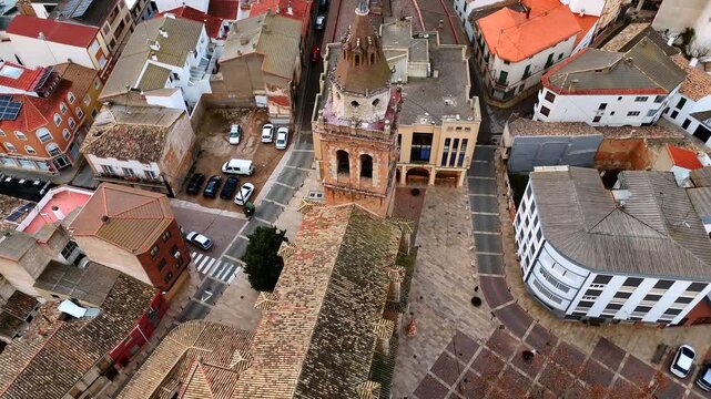 Drone orbit perspective of Tarazona church main square and rooftops 