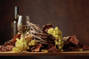 White wine and bunch of grapes.