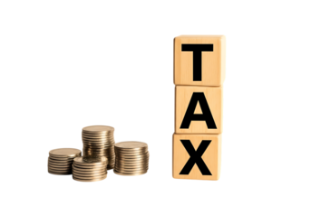 Tax concept illustrated with wooden blocks spelling tax and coins