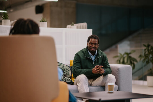 African american business man having office conversation