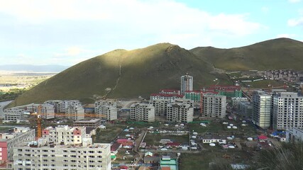 MONGOLIA, ULAANBAATAR - AUGUST 29, 2013: View of city from a high mountain on a sunny summer day.
