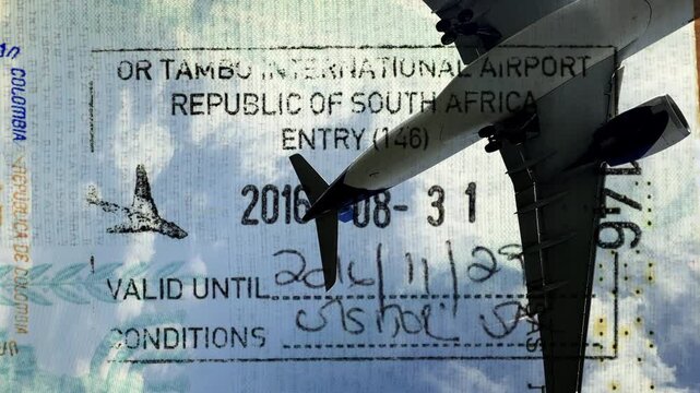 Airplane flying overhead and passport stamps 