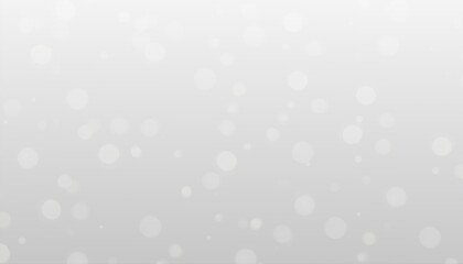 Abstract gray white gradient background with a white light bokeh blur.