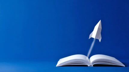 A paper rocket taking off from an open book symbolizes creativity and imagination. This digital artwork captures the concept of learning and exploration.