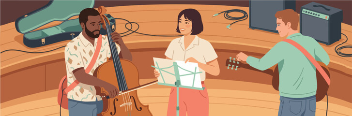 A small band rehearses on a wooden stage as three musicians practice together, tuning instruments and reviewing sheet music in a warm, creative studio atmosphere