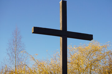 cross in the autumn leaves 