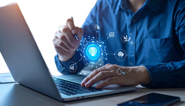 Person using a laptop with digital AI overlay, fingers near a digital brain graphic