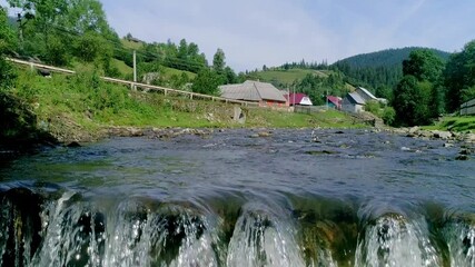 Water stream small river close up and slow motion, close-up slow motion of small river stream. gentle water flow creates soothing therapeutic atmosphere for relaxation themes