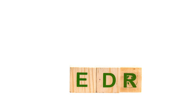 Three wooden cubes spell "EDR" in green against a black background