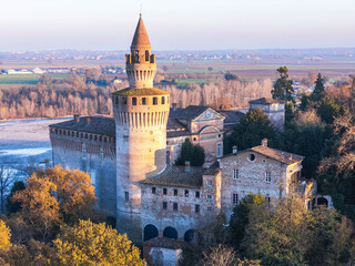 Historic Castello di Rivalta and surrounding countryside at sunset along the Trebbia River, Piacenza, Emilia-Romagna, Italy