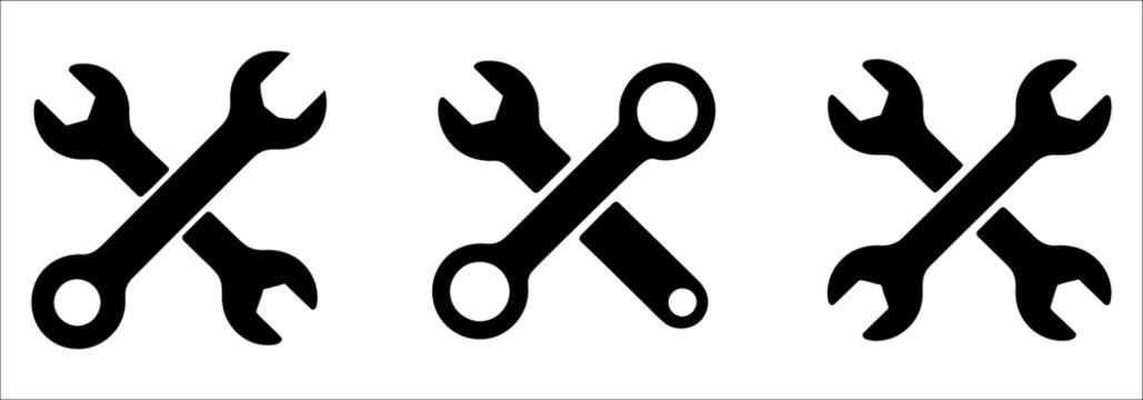Tools of the trade with crossed wrenches hinting at repair services, construction, engineering, and automotive work for your next project.