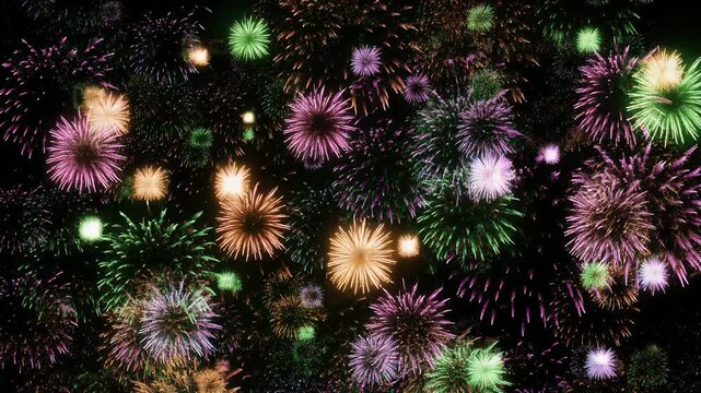 A vibrant display of colorful fireworks exploding against a dark green background.