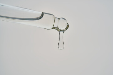 Cosmetic pipette dispensing serum dropping clear liquid