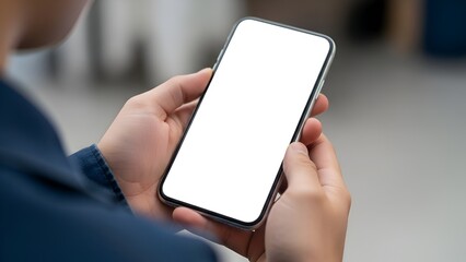 Close-up of a person holding a modern smartphone with a blank white screen