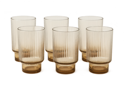 Elegant set of six textured amber glass tumblers, isolated on transparent background