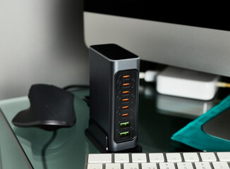 Battery charger. Multi-battery charger with multiple USB ports