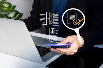 Business concept of verifying the accuracy of company personnel data through job qualifications and assigning job responsibilities via mobile phone.