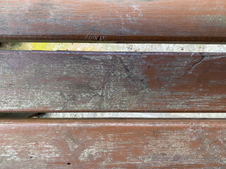 Close-up of weathered wooden bench planks for rustic outdoor design