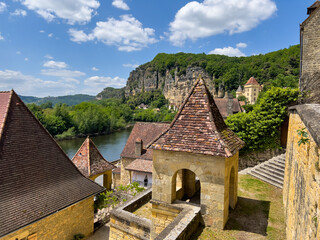Picturesque Medieval Village of La Roque Gageac Perched on Cliffside Overlooking Dordogne River in France