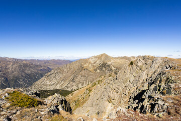 Pyrenees mountain landscape with Puymorens Gate under blue sky
