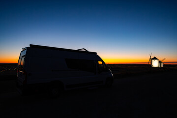 Camper van traveling Mota del Cuervo at twilight