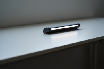 Modern Portable Led Lamp on Minimalist White Desk for Office or Home Lighting Interior Design and Technology Concept 150 Char