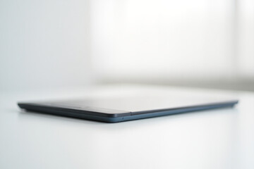 Sleek Gray Laptop Closed Shows Minimalist Design and Modern Technology Device for Professional Use Portability Computing Innovation