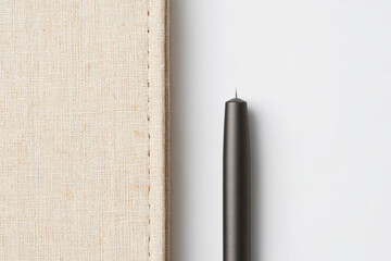 Stylus and Beige Notebook on White Surface for Note Taking and Design with Minimalist Look in Bright Light and Clean Modern Environment 150c