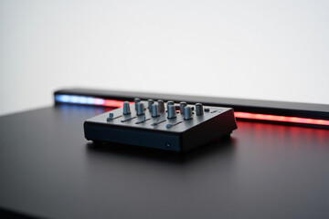 Audio Mixing Console and Light Bar Professional Sound Equipment Recording Studio Gear Modern Audio Technology Contemporary Setup Music Production