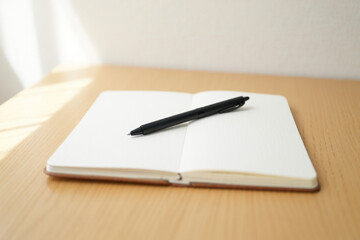 Open Notebook and Black Pen on Wooden Table Displaying Blank Pages and Smooth Writing Instrument Ready to Capture Thoughts Ideas or Daily Tasks List