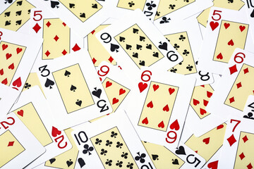 Casino cards as background.Background on the theme of playing cards and poker.A pile of gaming cards.Poker card texture.Casino.