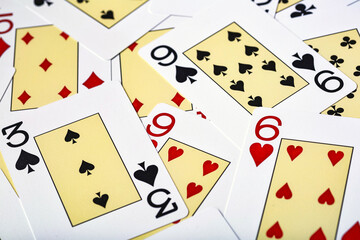 Casino cards as background.Background on the theme of playing cards and poker.A pile of gaming cards.Poker card texture.Casino.